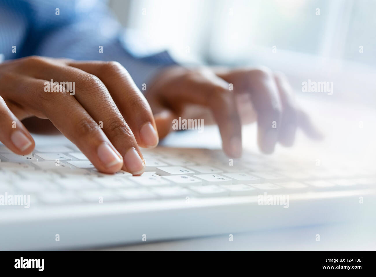African american hands typing hi-res stock photography and images - Alamy