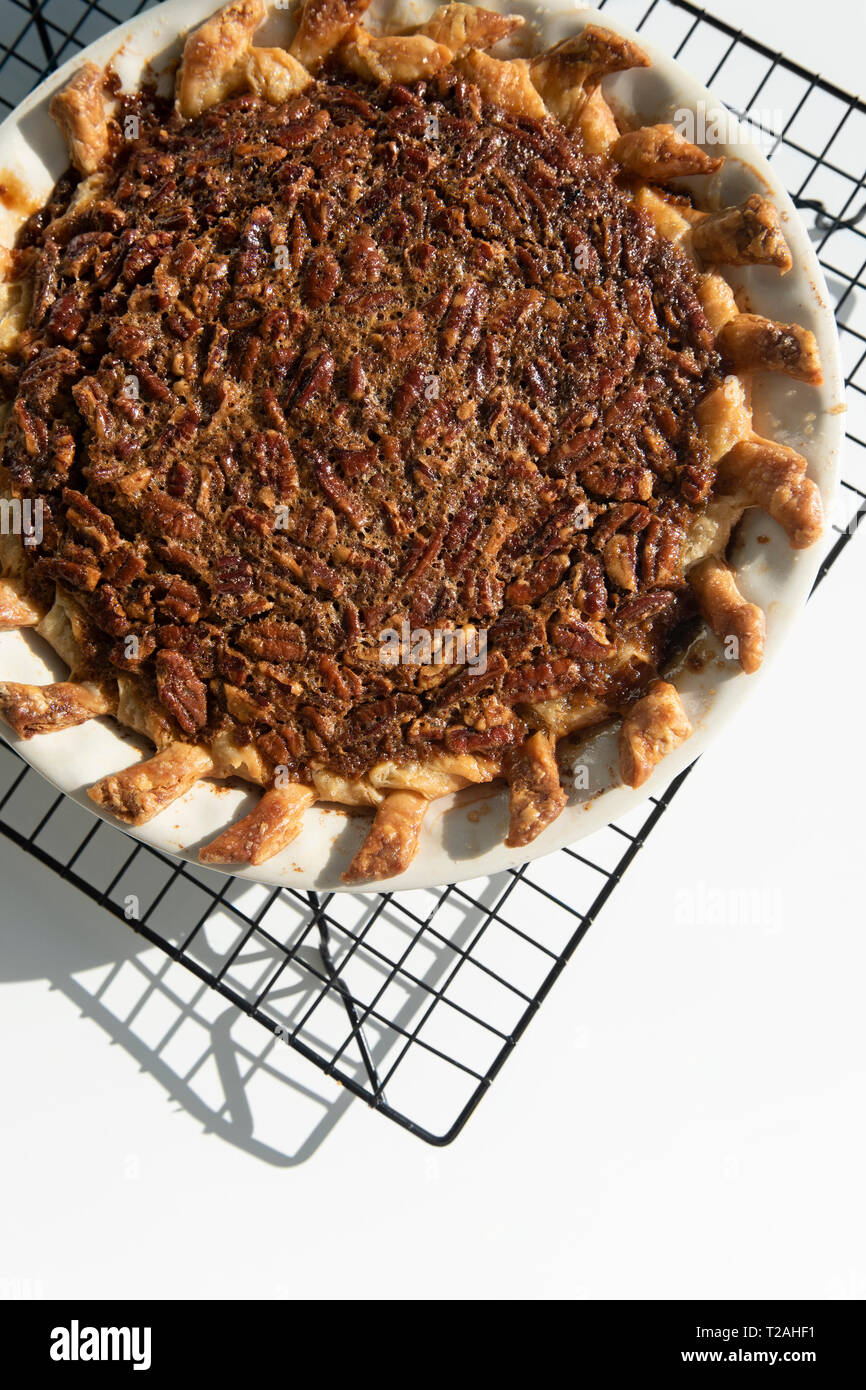 Pecan pie on cooling rack Stock Photo - Alamy