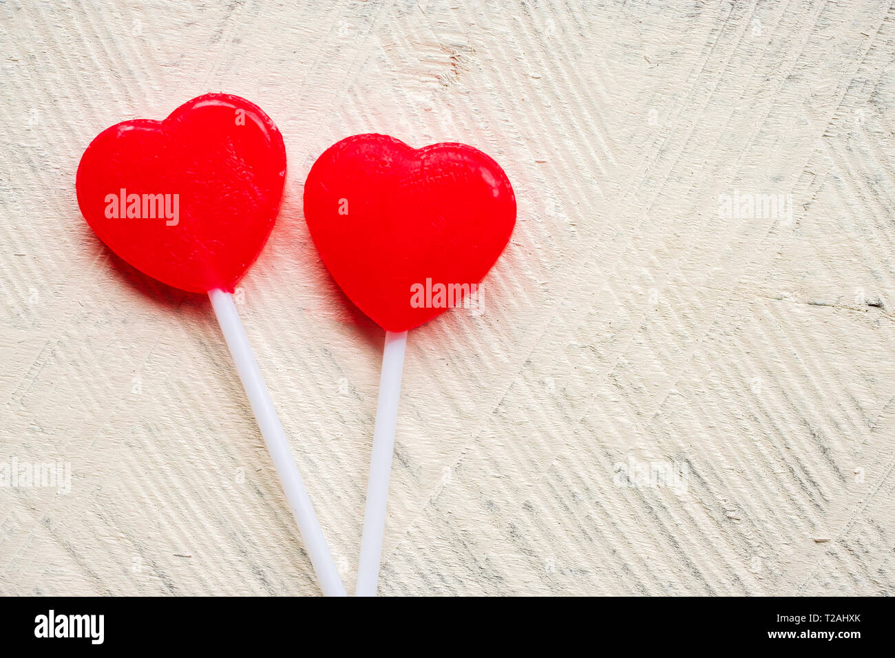 Red heart shaped lollipops Stock Photo