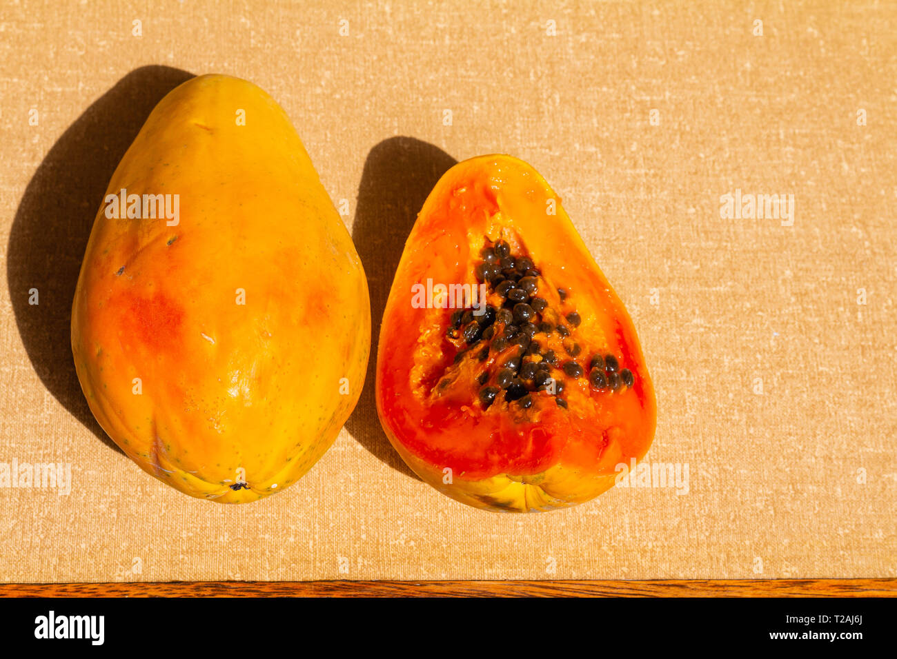 Papaya fruit with textured background. Stock Photo