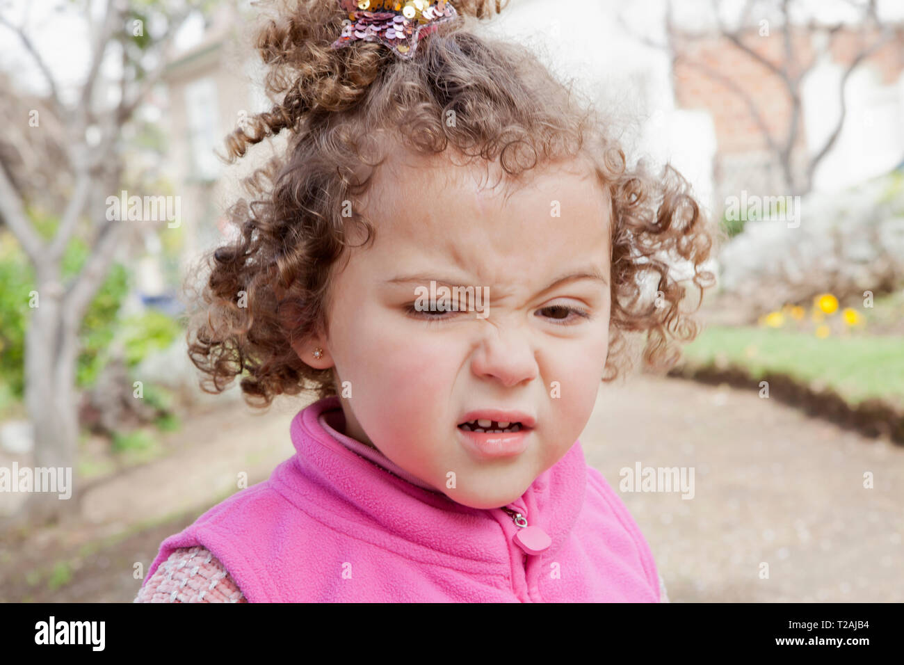 Girl with disgusted expression Stock Photo