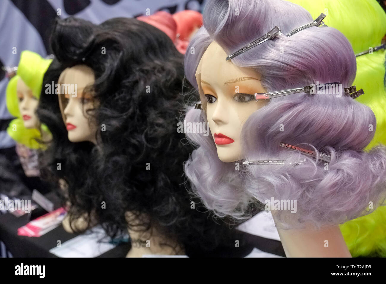 Wigs on mannequin heads Stock Photo - Alamy