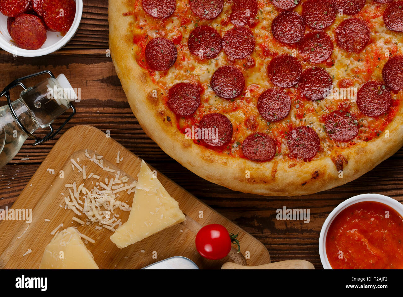 Pepperoni pizza with ingredients Stock Photo Alamy