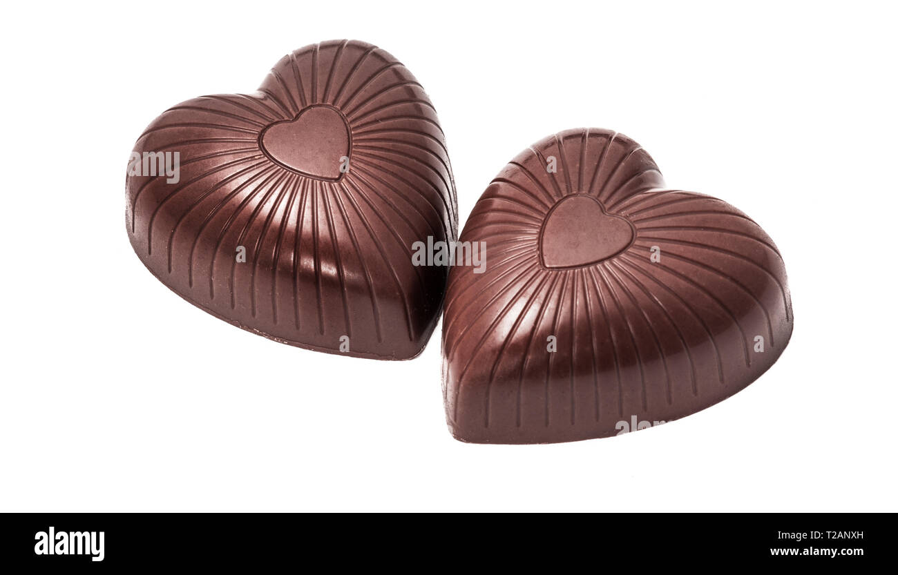 Heart shaped candy isolated on white. Valentine's chocolate Stock Photo