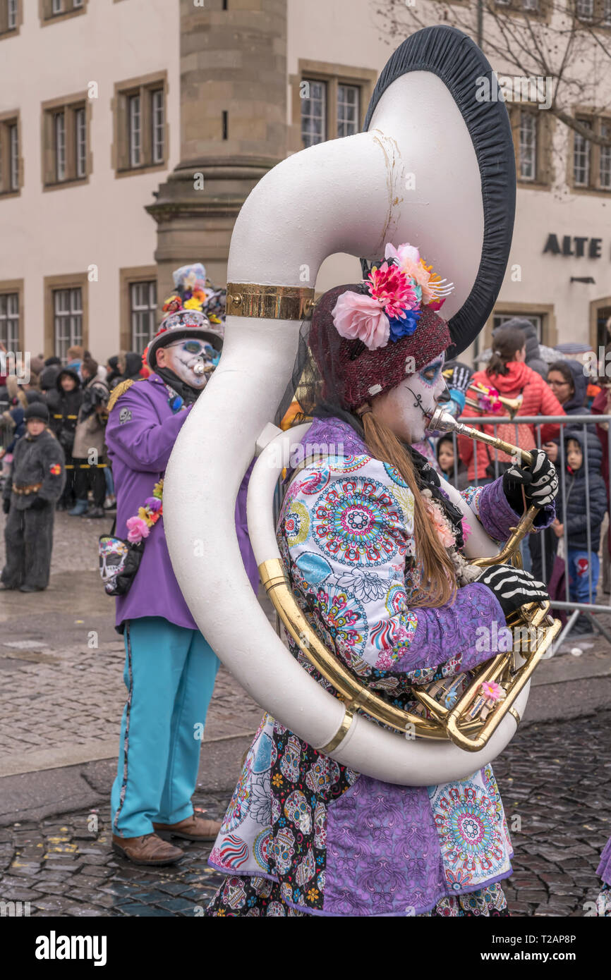 STUTTGART, GERMANY MARCH 5 female tuba player in marching band with