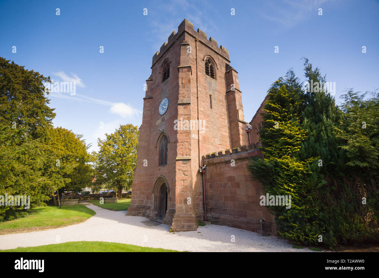 Built in the 14th century Saint Mary the Virgin Church Overton on Dee home of the Overton yew trees one of the seven wonders of Wales Stock Photo