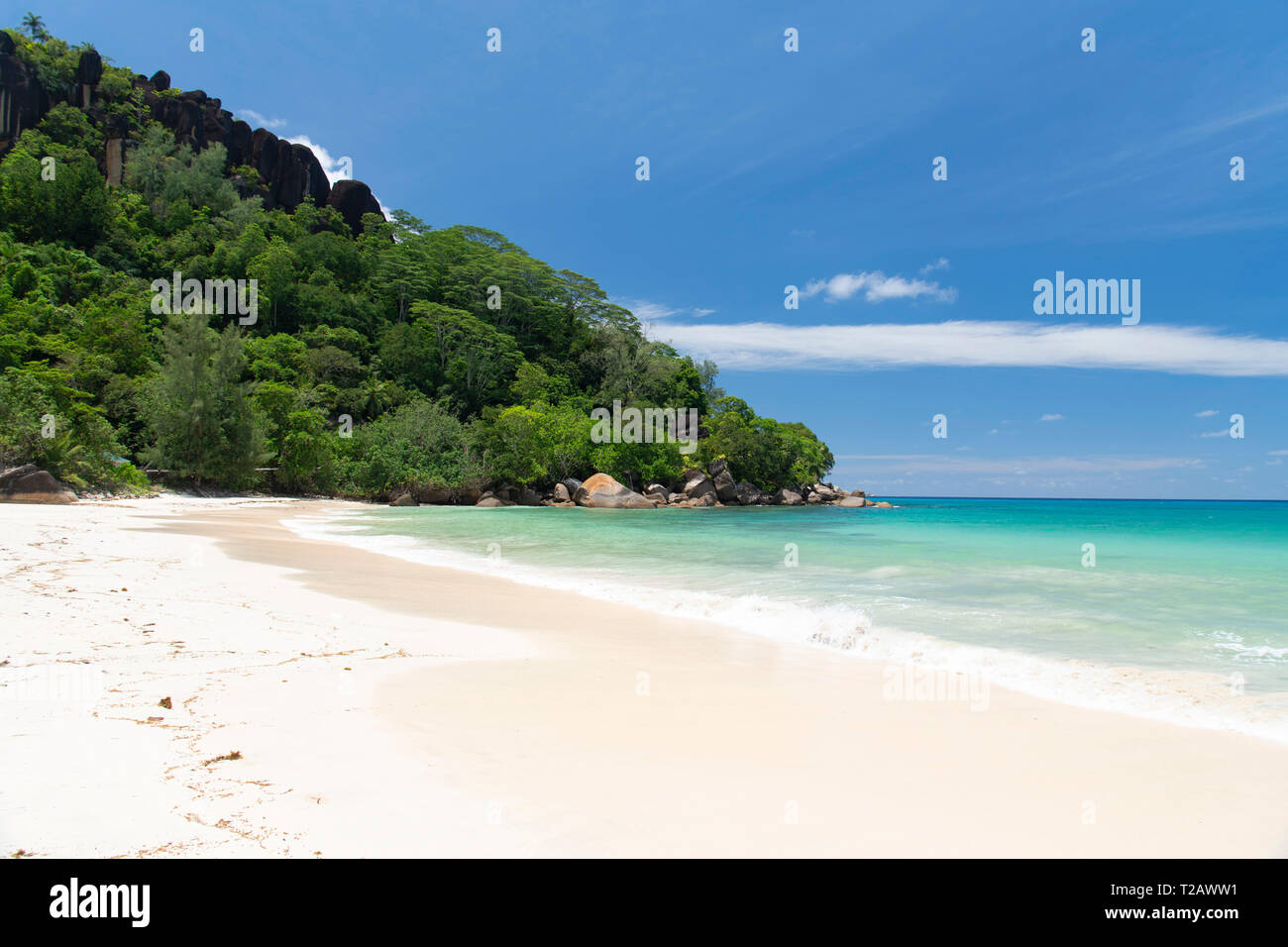 Anse Louis next to a wooded headland on the southwest coast of Mahe, the Seychelles, Africa, the Indian Ocean Stock Photo