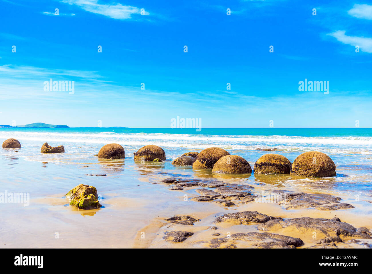 Moeraki boulders on Koyokokha beach in the Otago region, New Zealand. Copy space for text Stock Photo