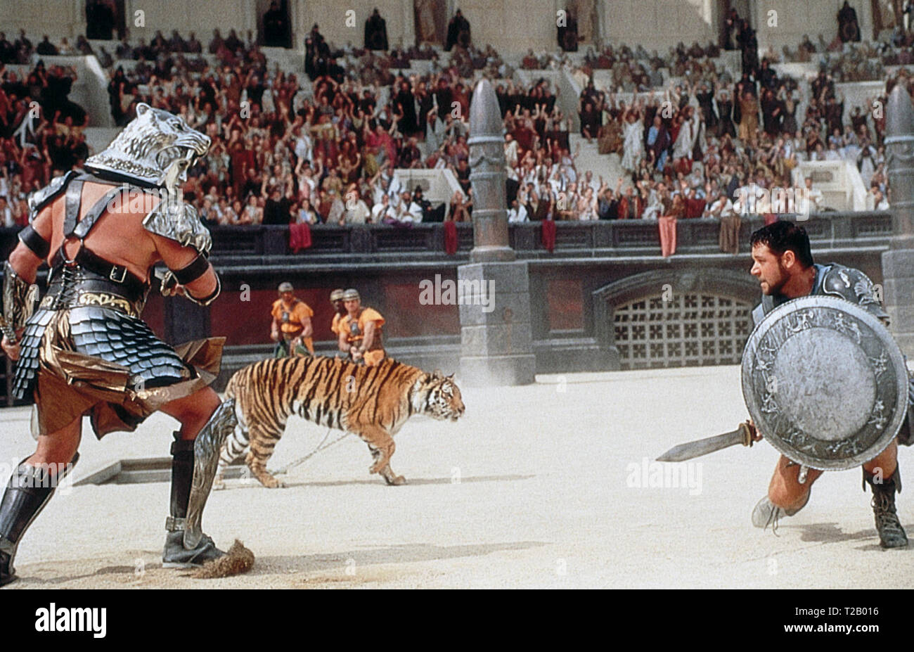 Gladiator is a 2000 epic historical drama film directed by Ridley Scott and written by David Franzoni, John Logan, and William Nicholson. The film was jointly produced and released by DreamWorks Pictures and Universal Pictures. It stars Russell Crowe, Joaquin Phoenix, Connie Nielsen, Ralf Möller, Oliver Reed, Djimon Hounsou, Derek Jacobi, John Shrapnel, and Richard Harris.    This photograph is for editorial use only and is the copyright of the film company and/or the photographer assigned by the film or production company and can only be reproduced by publications in conjunction with the prom Stock Photo