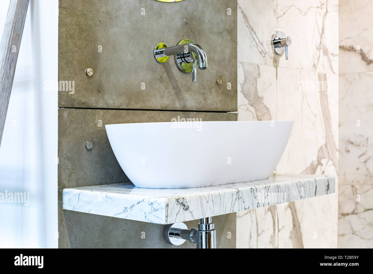 Water tap sink with faucet in expensive loft bathroom Stock Photo Alamy