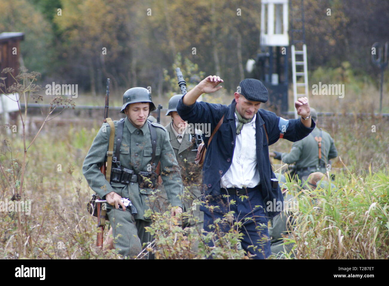 Waffen-SS soldiers taking prisoners of war, reenactment Stock Photo