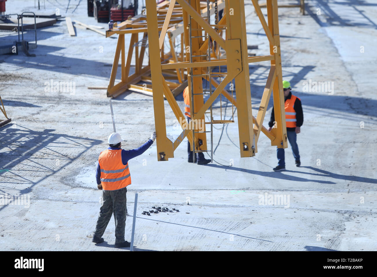 Bucharest, Romania - March 19, 2019: Workers on a construction site Stock Photo