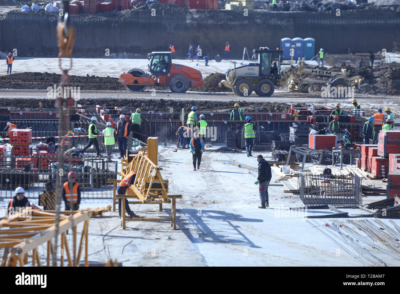 Bucharest, Romania - March 19, 2019: Workers on a construction site Stock Photo