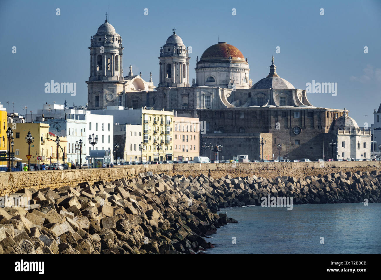 Cadiz Cathedral over the city with breakwater Stock Photo