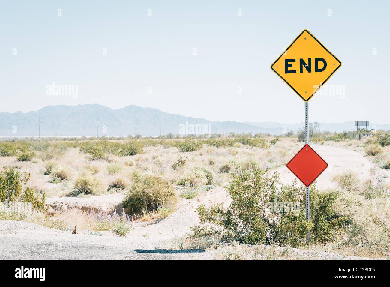 dead end sign on a dead end road in the desert Stock Photo