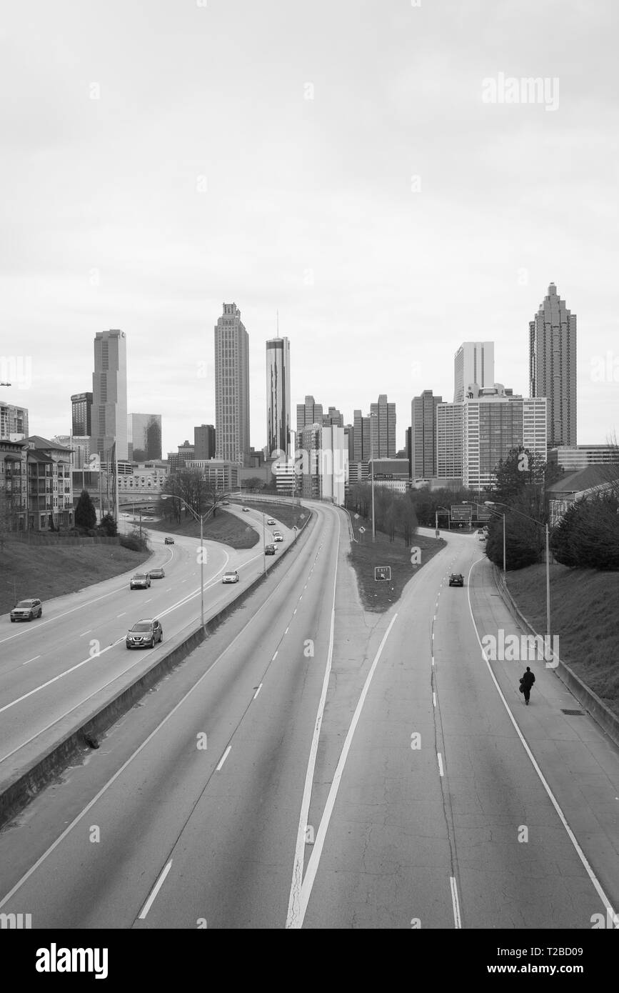 Black & white image of Freedom Parkway and the Atlanta skyline, in