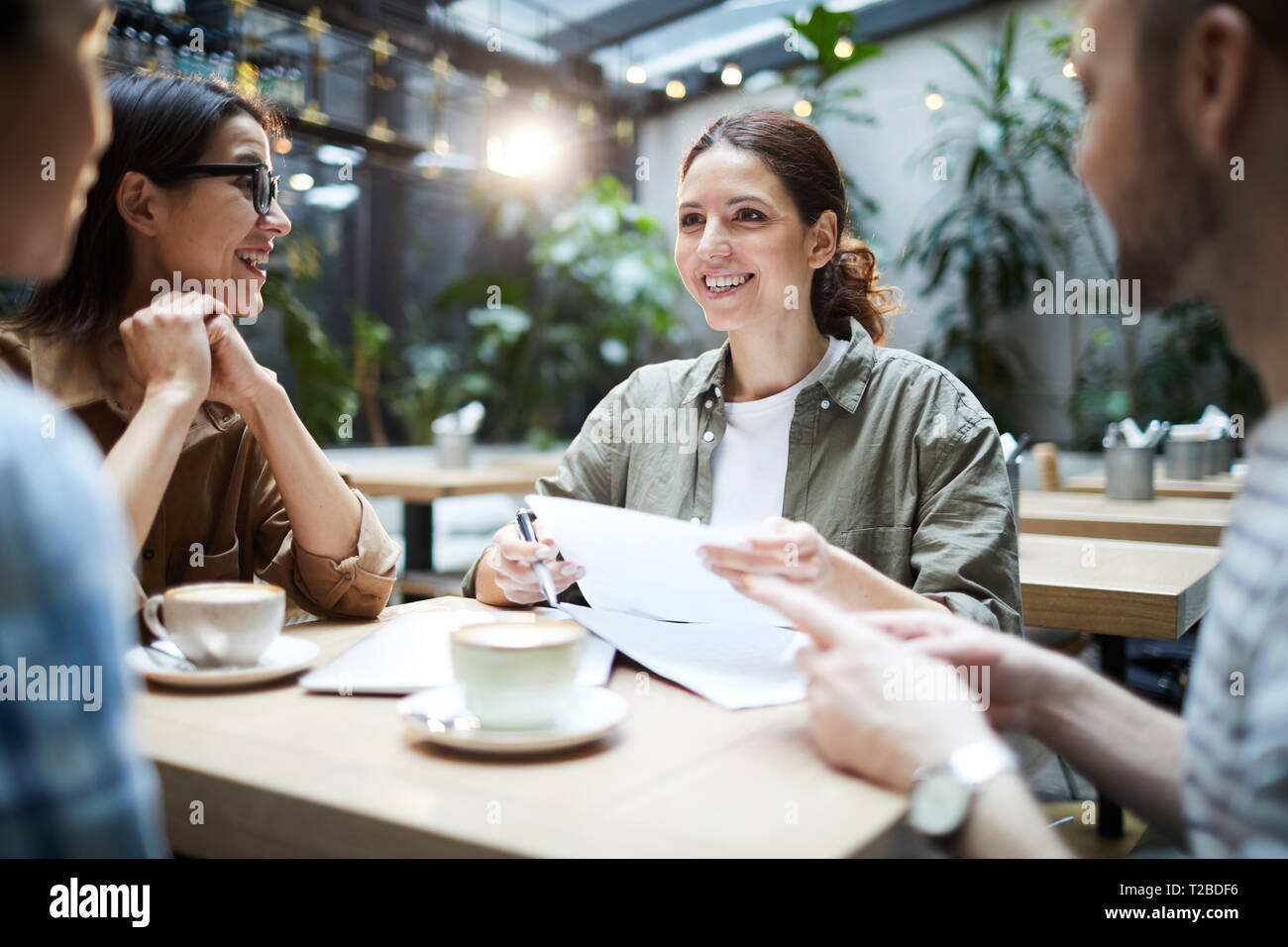 Cheerful startuppers working on new project Stock Photo