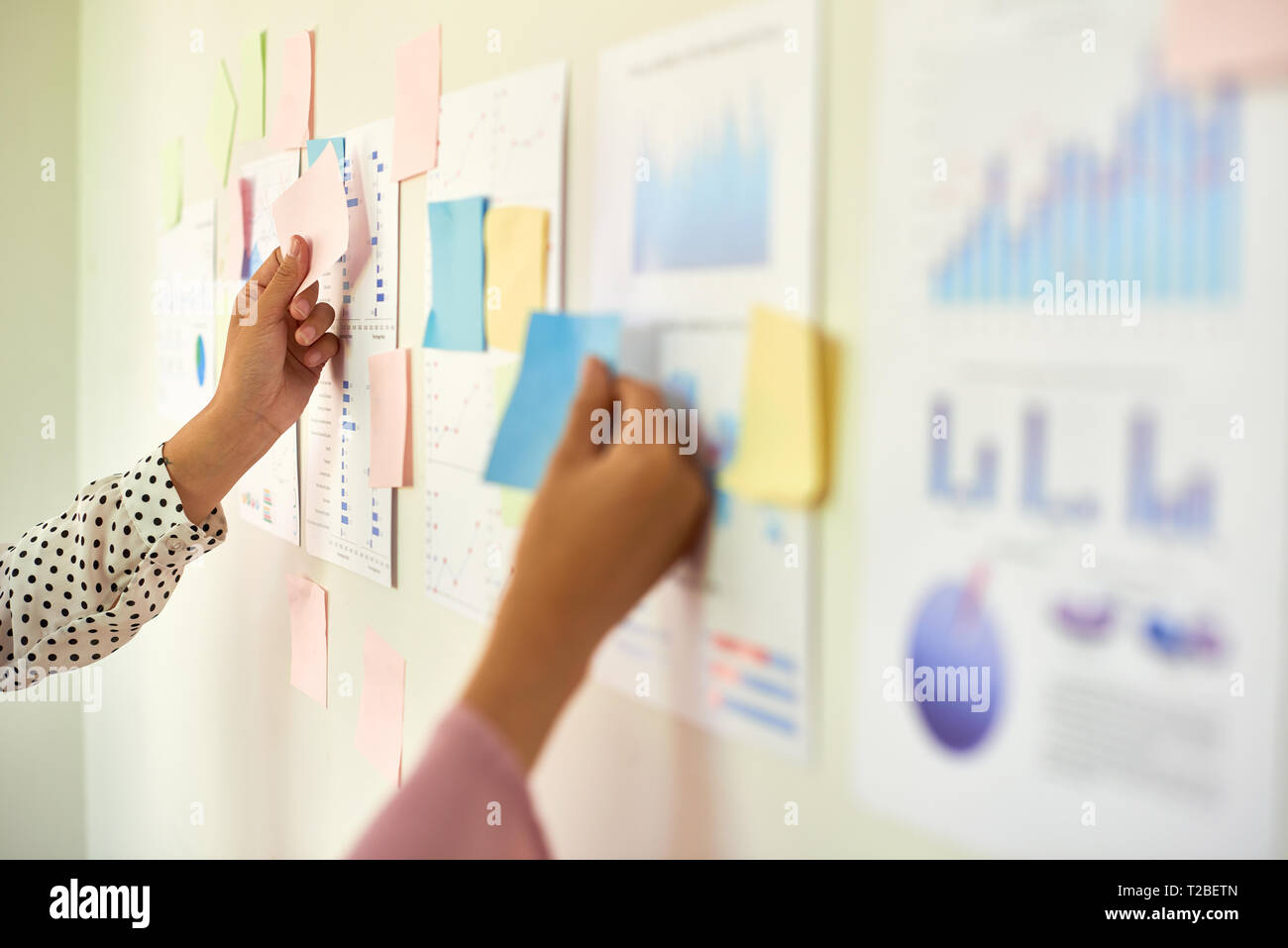 Entrepreneurs discussing reports Stock Photo