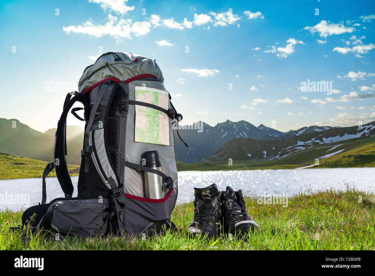 hiking backpack and boots outdoors Stock Photo - Alamy