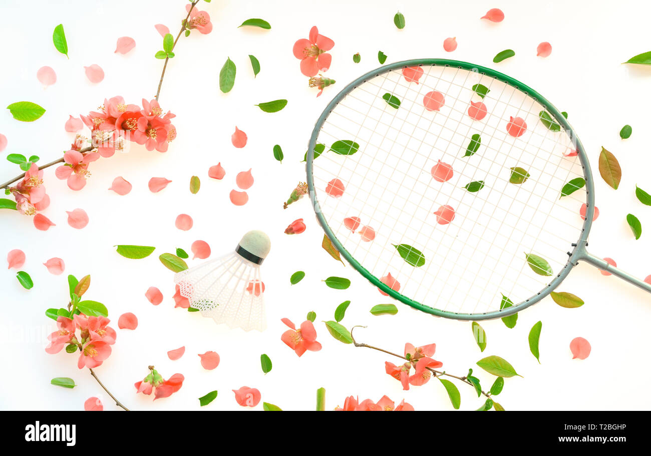 Badminton racket and shuttlecock with springtime floral decoration Stock Photo Alamy