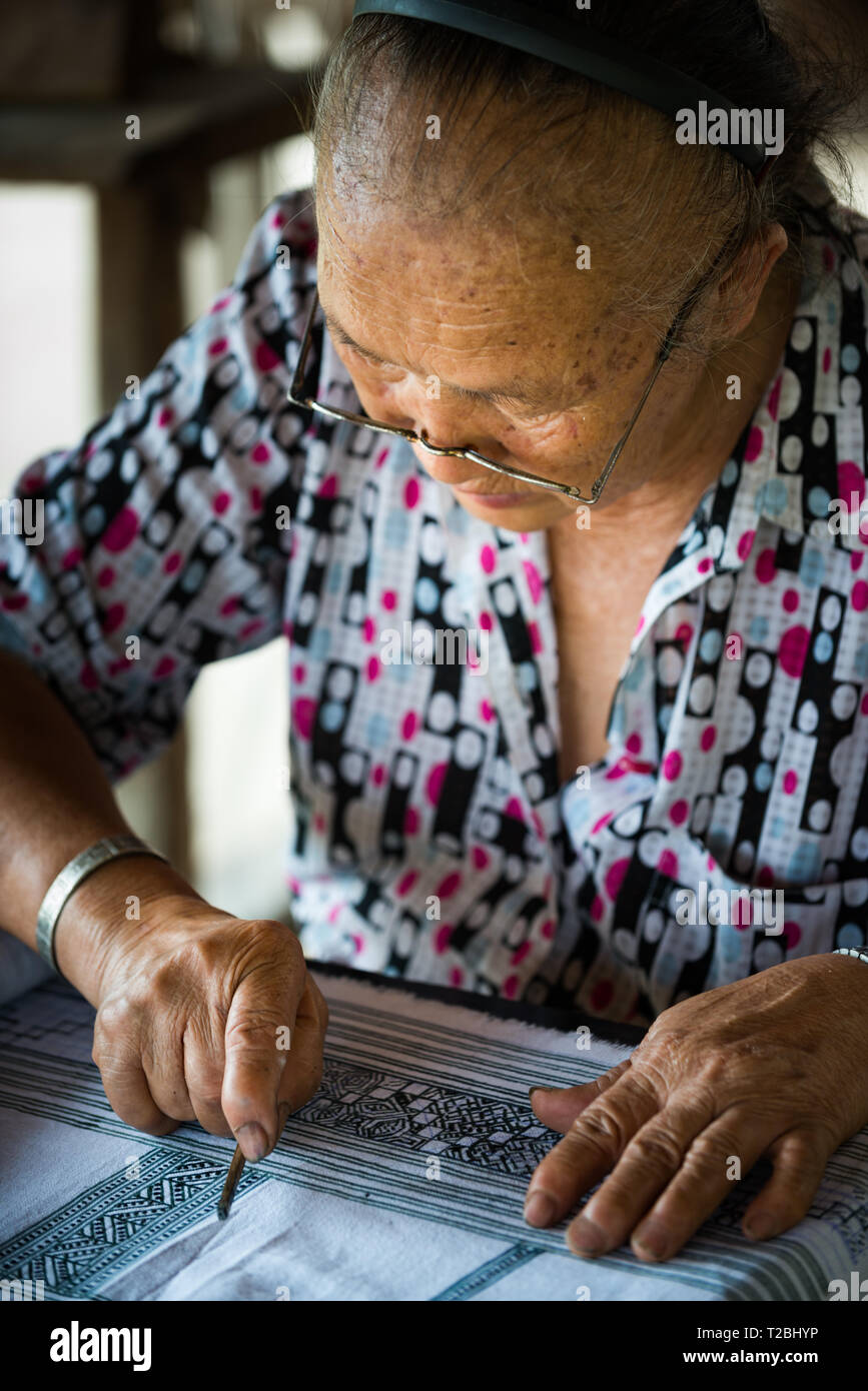Baan Tong Luang Chiang Mai Thailand April 16 2018 elderly tribal woman working on her batik process Stock Photo