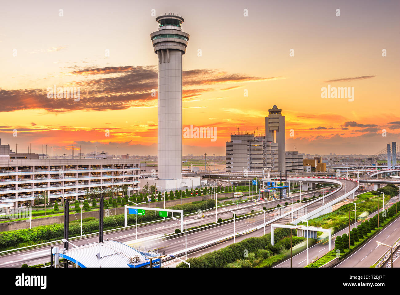 Tokyo, Japan at the control tower of Haneda Airport at dusk. Stock Photo