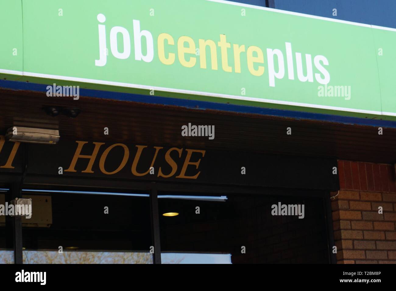 sign above jobcentre in reading uk stock photo alamy