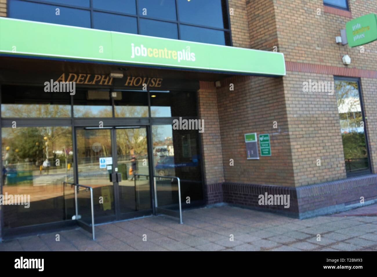 sign above jobcentre in reading uk stock photo alamy