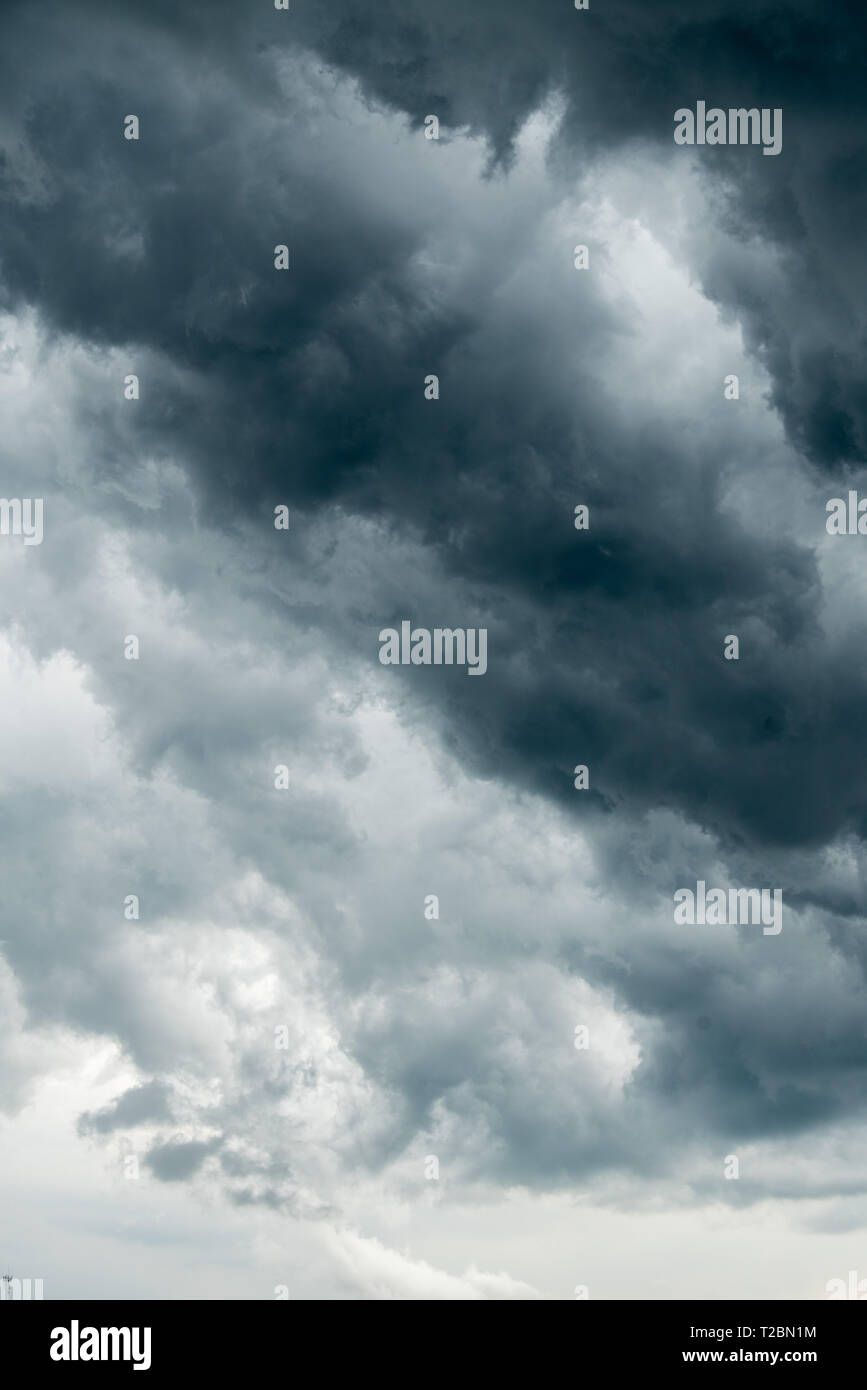 storm cloud background during raining. Dark Clouds. Huge black clouds ...