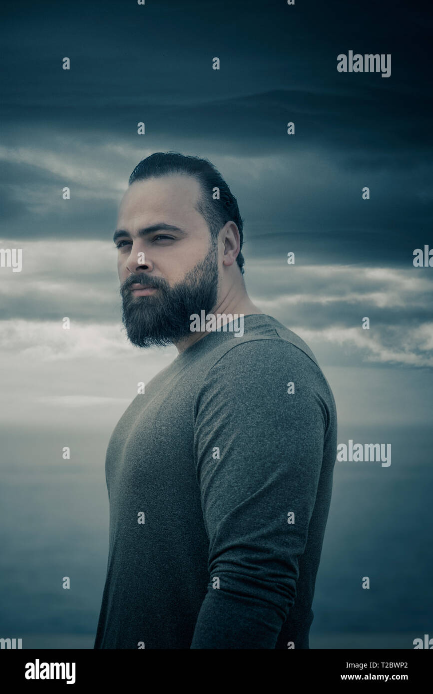 Serious muscular young bearded hi-res stock photography and images - Alamy