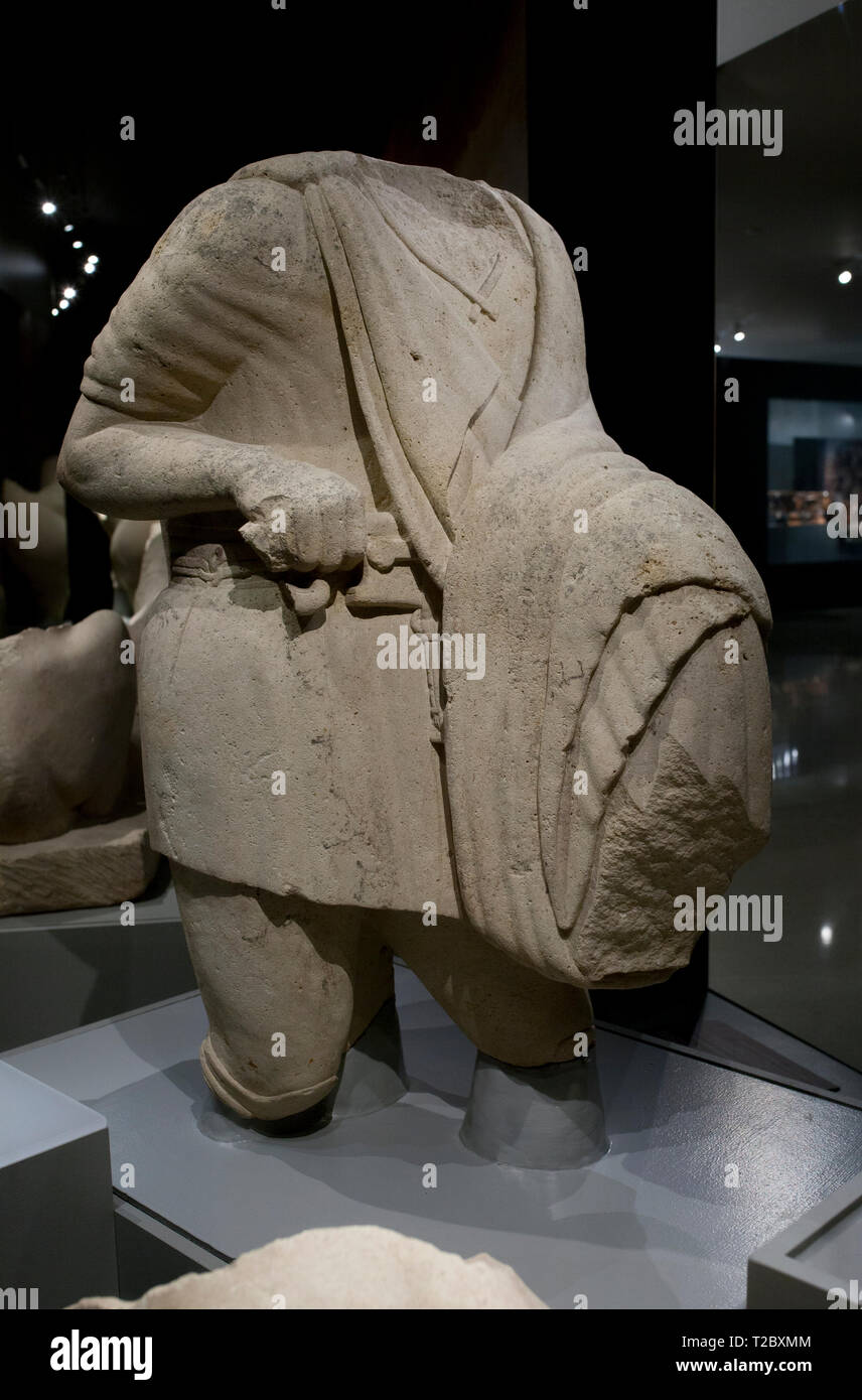 Jaen, Spain - December 29th, 2017: Hero armed with falcate sword. El Pajarillo Shrine, Huelma Jaen, 4th Century BCE. Iberian Museum of Jaen Stock Photo