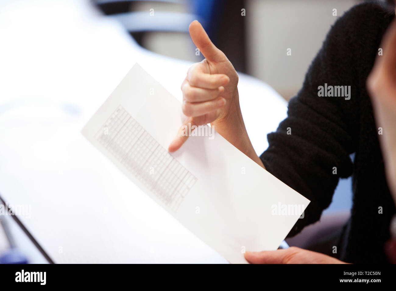 Making a point using hands during office meeting Stock Photo