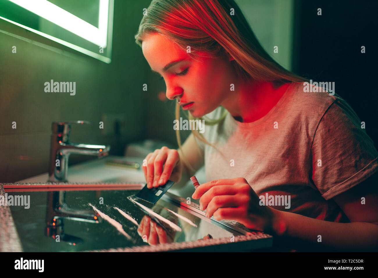 Drugs Kill You Young Drug Addict Making Cocaine Line With Black Credit Card On Glass Surface In Night Club S Toilet Say No To Drugs Stop Drug Abuse Stock Photo Alamy