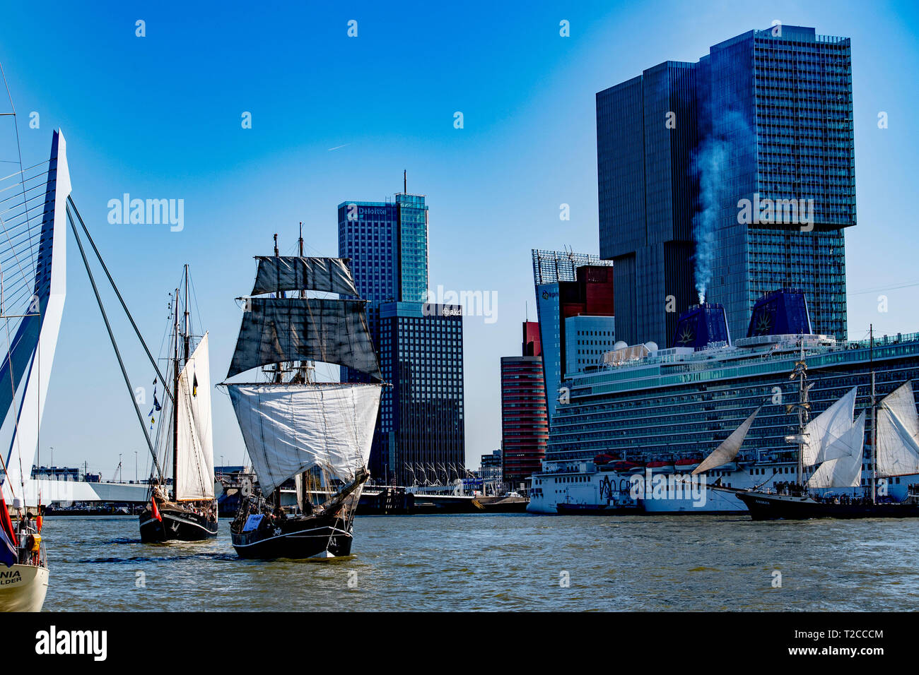 Rotterdam, the Netherlands. 1st April, 2019. Classic sailing ships sail at the start of Race of the Classics on the Maas along the Erasmus bridge. The 31 edition of the student sailing event ends April 8 in Amsterdam. Credit: robin utrecht/Alamy Live News Stock Photo