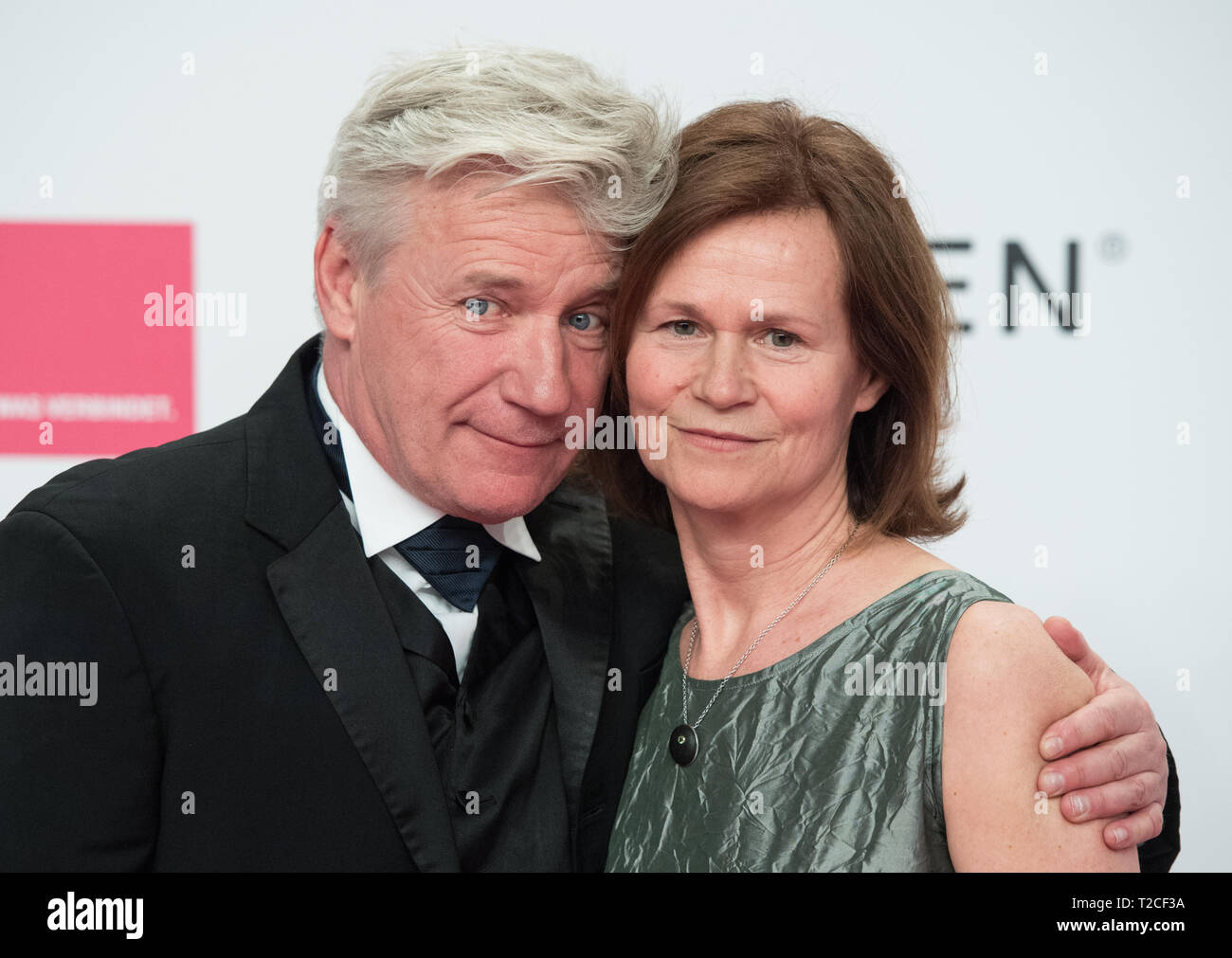Actor Joerg SCHUETTAUF (nominated for the category 'Best Actor') with wife Martina BEECK Red carpet for the Golden Camera 2019 in Berlin, Germany on 30.03.2019. | Usage worldwide Stock Photo