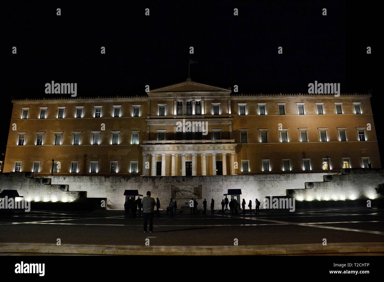 Athens, Greece. 30th Mar, Greek Parliament seen a minutes before the Earth Hour 2019.Earth Hour is a worldwide movement organized by the World Wide Fund for Nature (WWF). The event