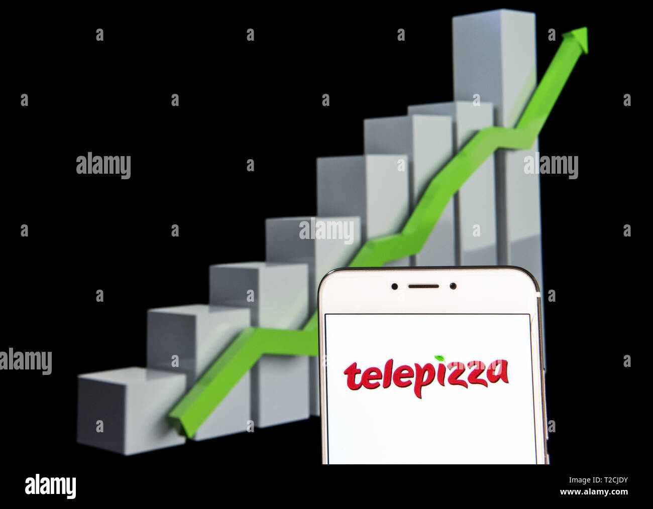 February 10, 2019 - Hong Kong - In this photo illustration a Spanish pizza restaurant franchise Telepizza logo is seen on an android mobile device with an ascent growth chart in the background. (Credit Image: © Budrul Chukrut/SOPA Images via ZUMA Wire) Stock Photo