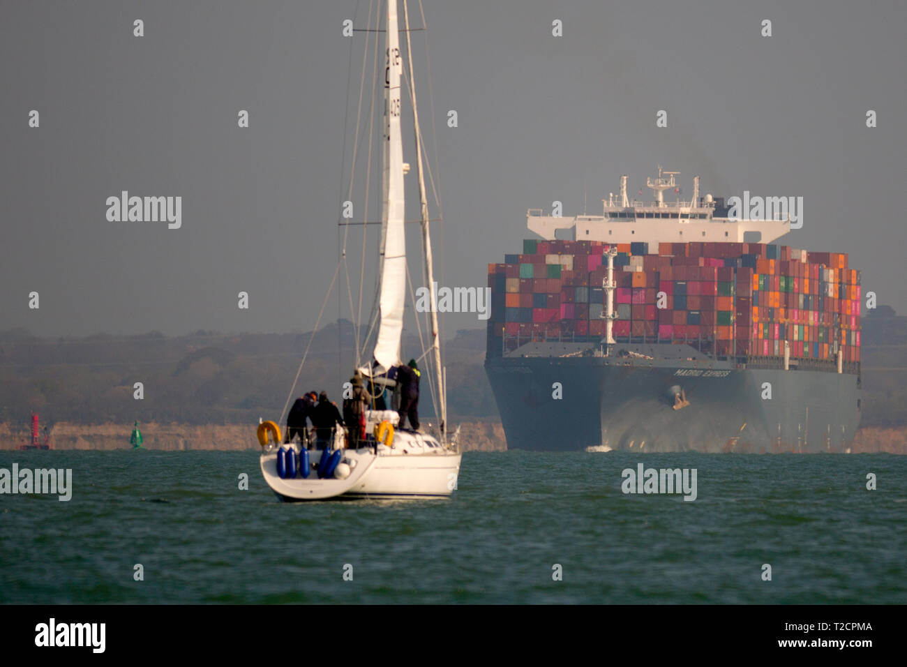 Container,Ship,Madrid,Express,Southampton,Port,Harbour,Escourt,Launch,services,Master,departure,water,The Solent,Cowes,Isle of Wight,UK, Stock Photo
