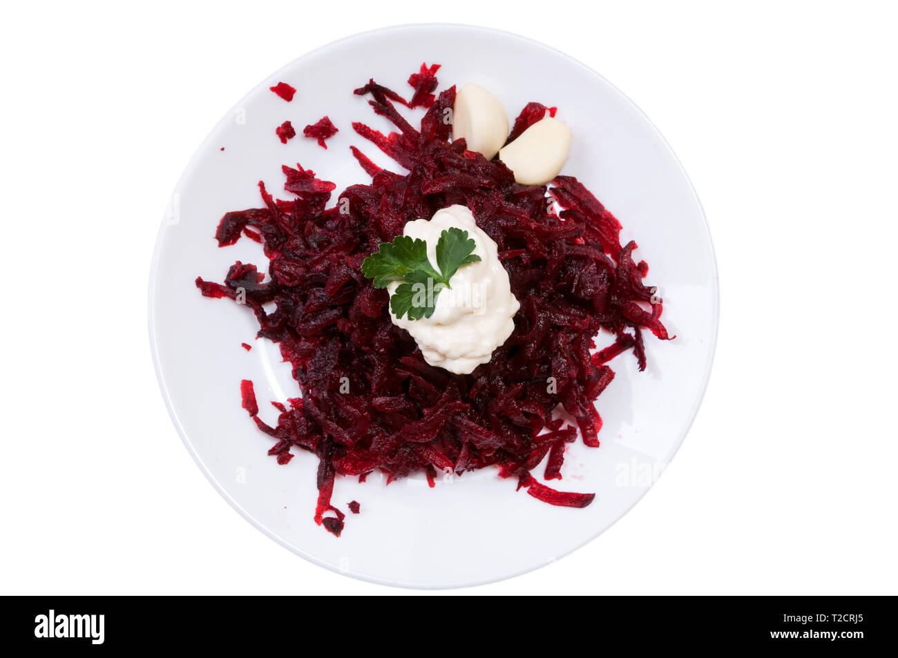 Grated beets in a plate isolated on white background Stock Photo