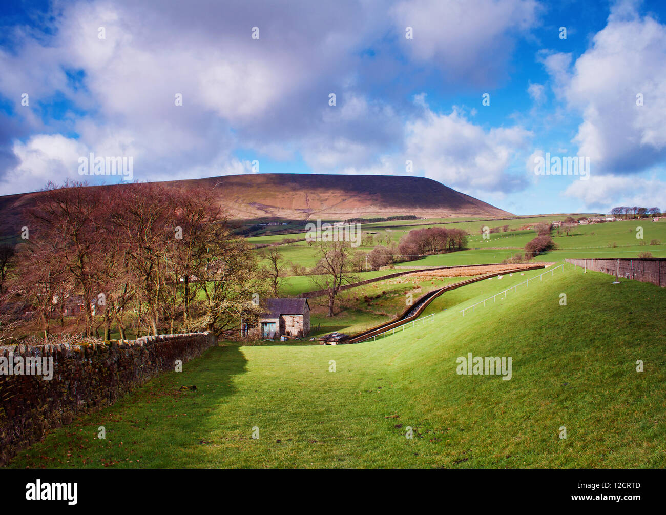 Clouds over Pendle Hill, viewed from rural Barley, Lancashire Stock Photo