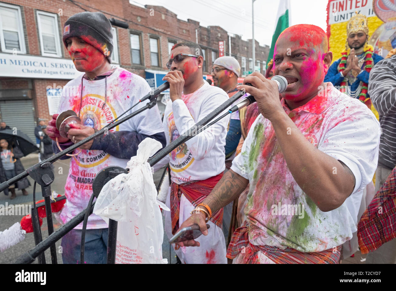 Hindu men praying on a float in the annual Holi Parade clebrating the arrival of Spring. In Richmond Hill, Queens, New York Stock Photo