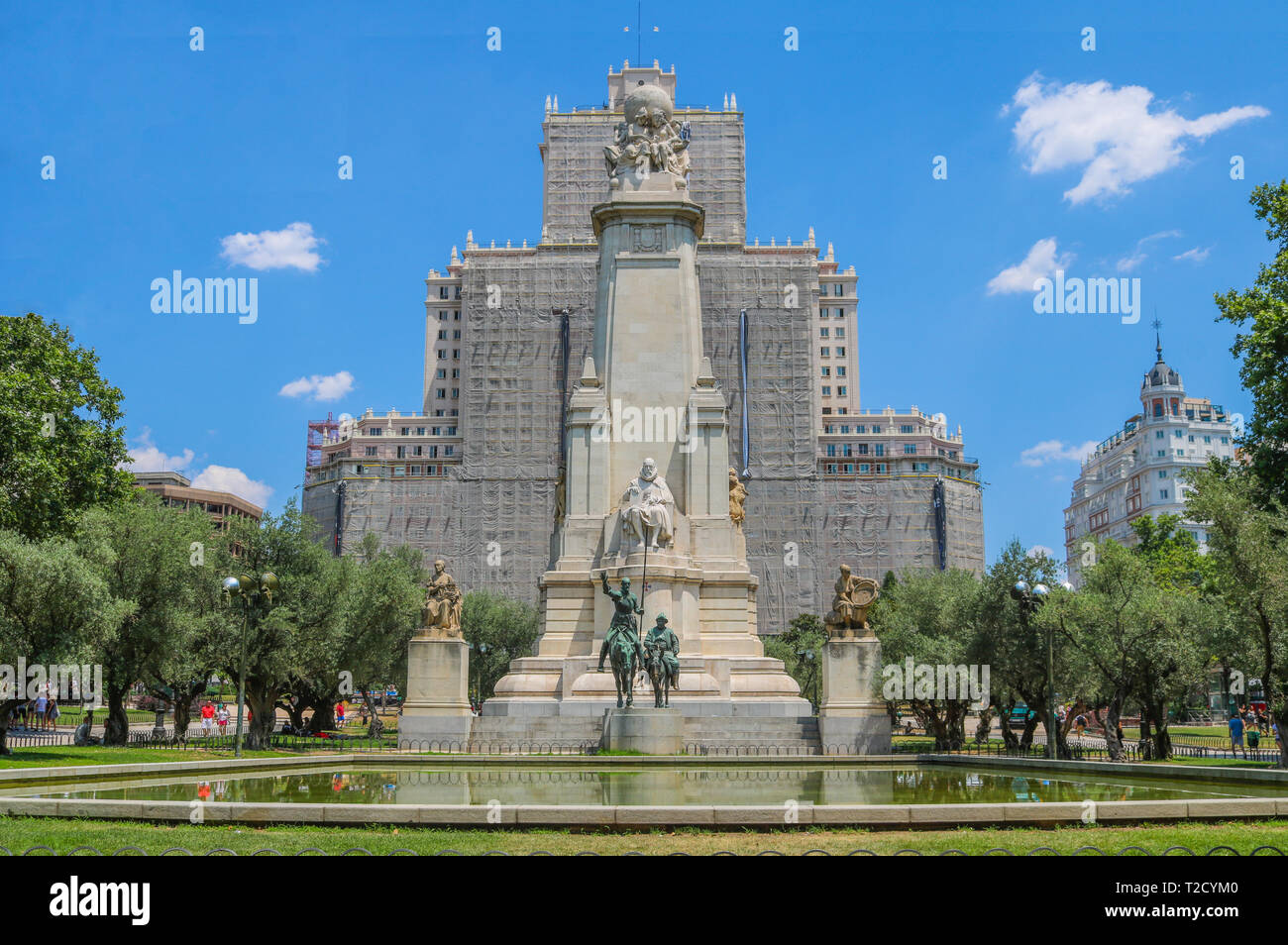 Monumento Cervantes upfront. Behind is the Edificio España under reparations. Shoot in July 2018 Stock Photo