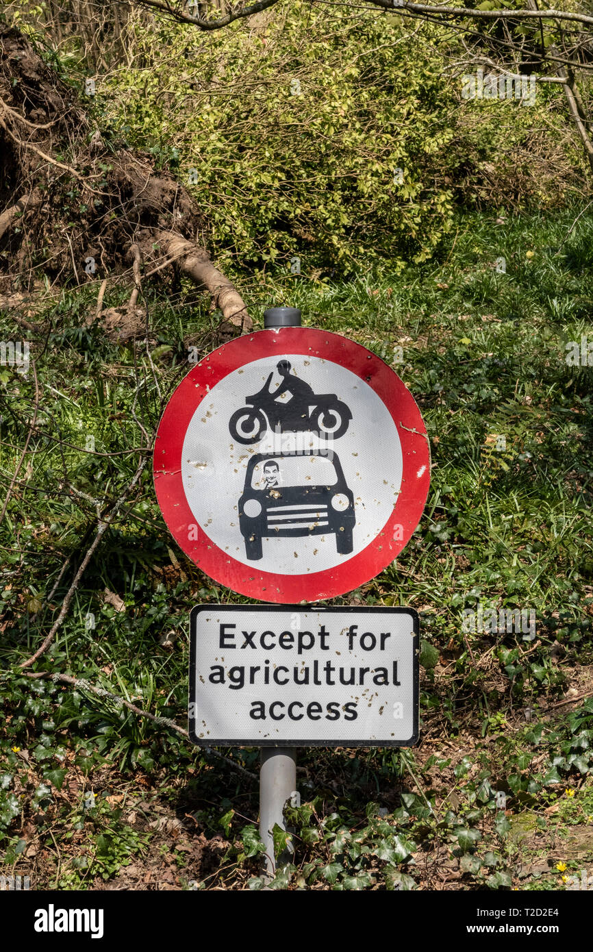 Sign post, no vehicles, vehicular access except agricultural access. Stock Photo