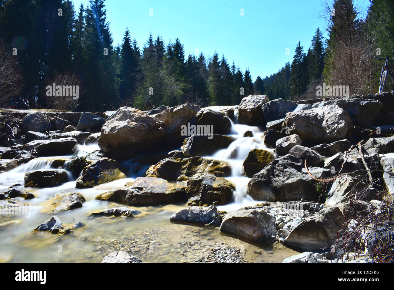 Photo of a river and a waterfall in the bavarian alps Stock Photo - Alamy