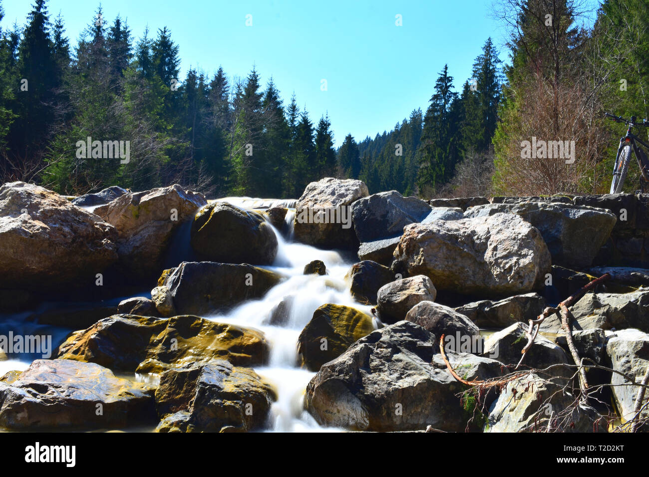 Photo of a river and a waterfall in the bavarian alps Stock Photo - Alamy