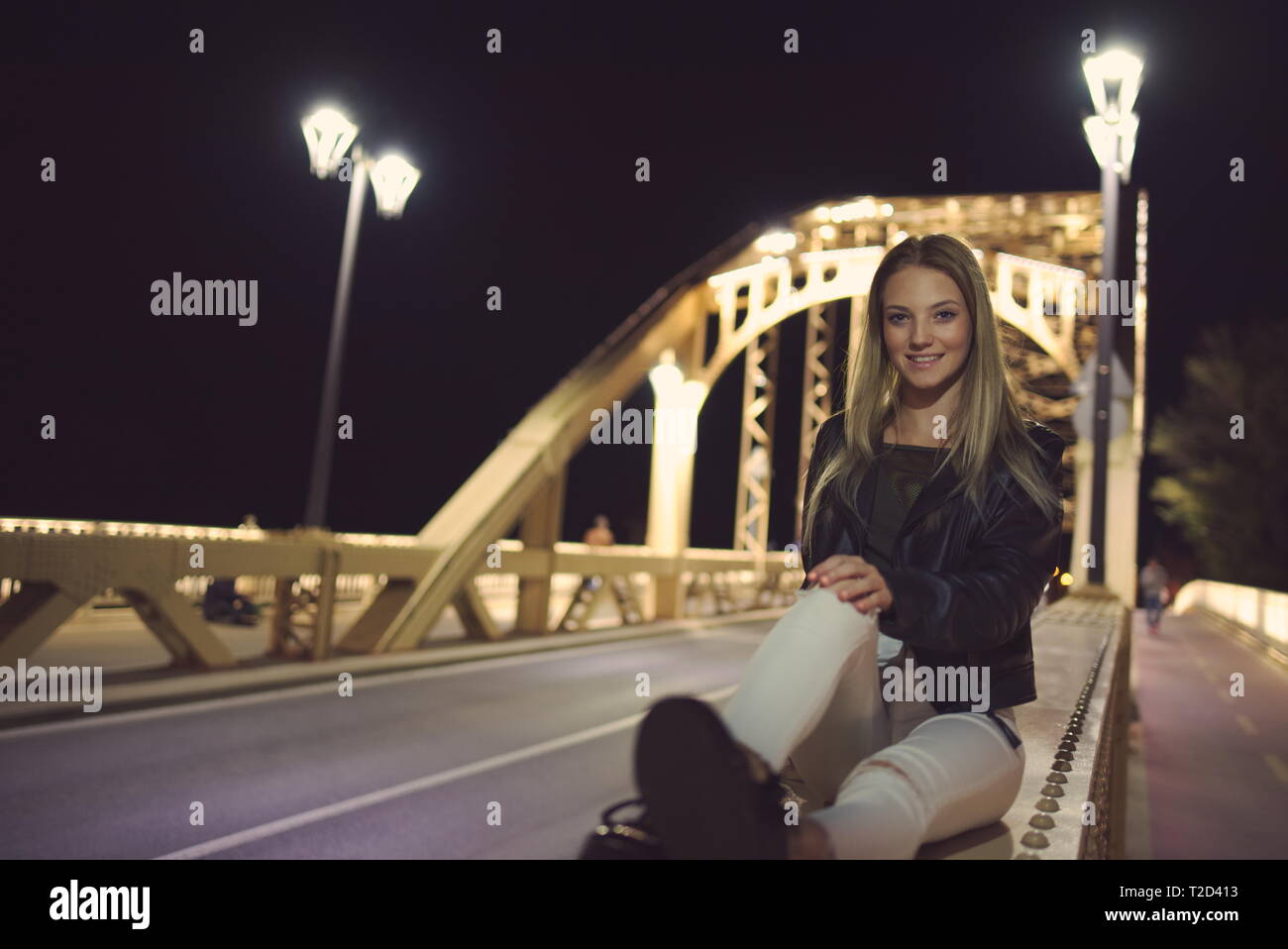 Teen Girl Night Portrait on The Bridge Stock Photo