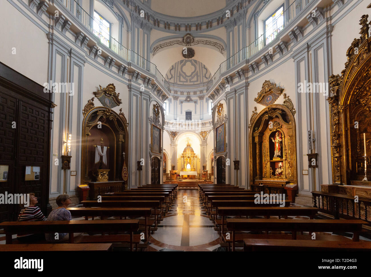 Malaga church - the nave in the interior of Iglesia de  San Felipe Neri (Church of San Felipe Neri), Malaga old town, Malaga Andalusia Spain Stock Photo