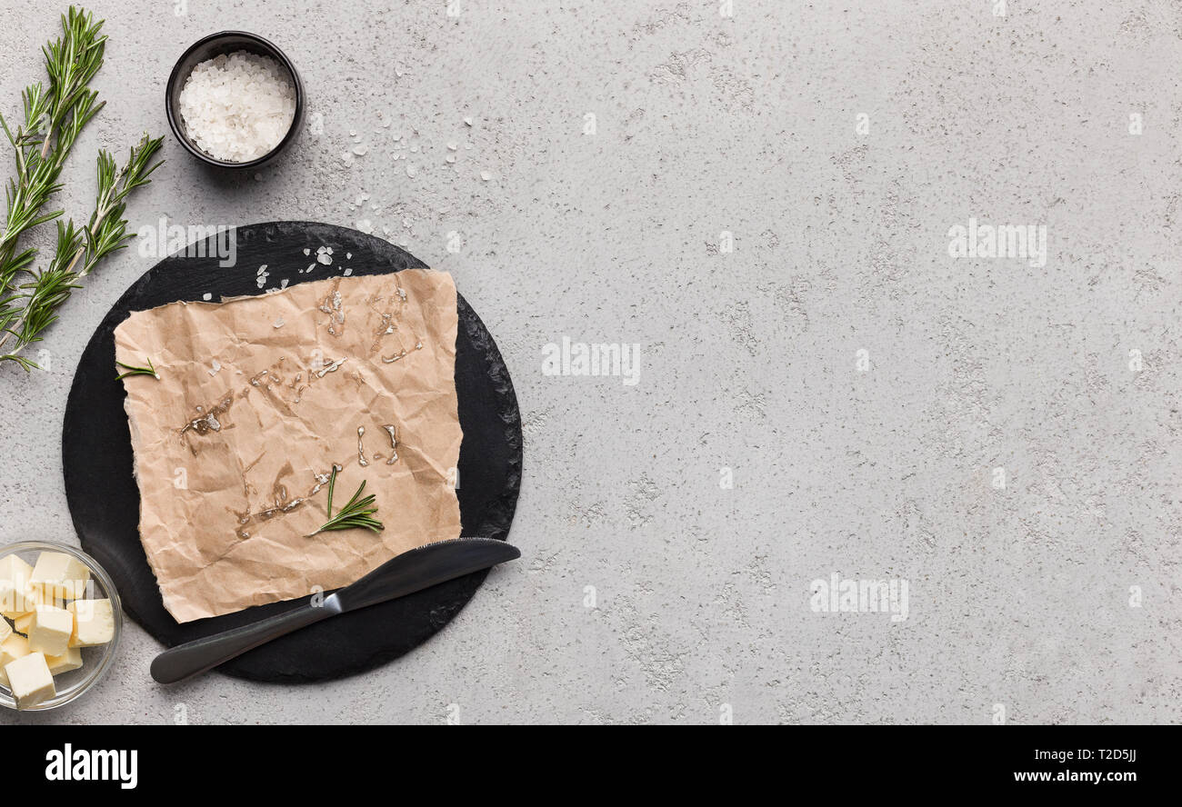 Download Cubes Of Butter In Bowl Rosemary Leaves And Craft Paper On Board Over Concrete Background Top View Copy Space Spicy Butter Recipe Mockup Stock Photo Alamy