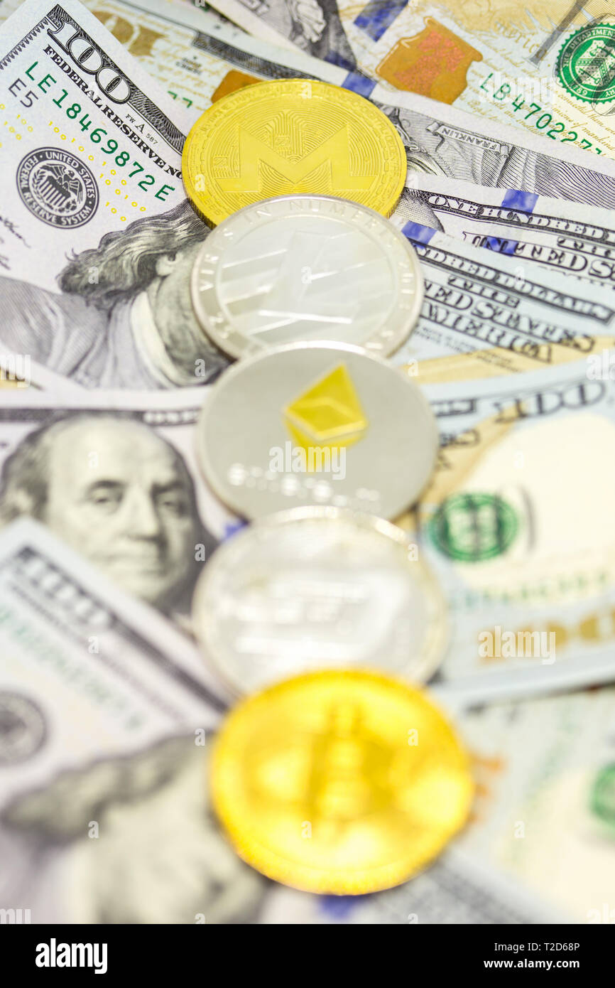 Monero coin and dollar bills on the background, concept of crypto currency  exchange and trading, business, new cirtual money Stock Photo - Alamy
