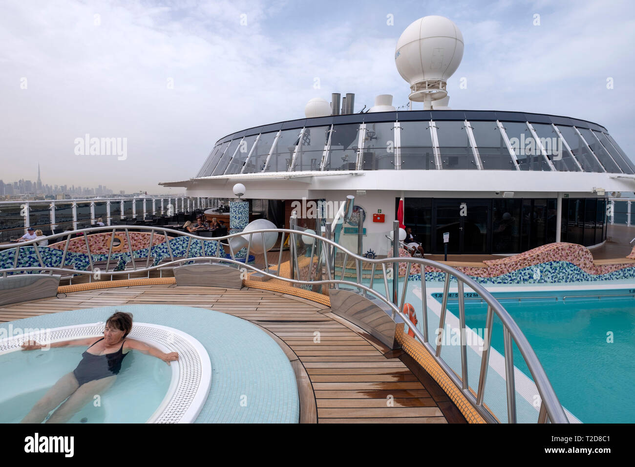 Woman enjoying the swimming pool on the cruise ship MSC Splendida Stock Photo